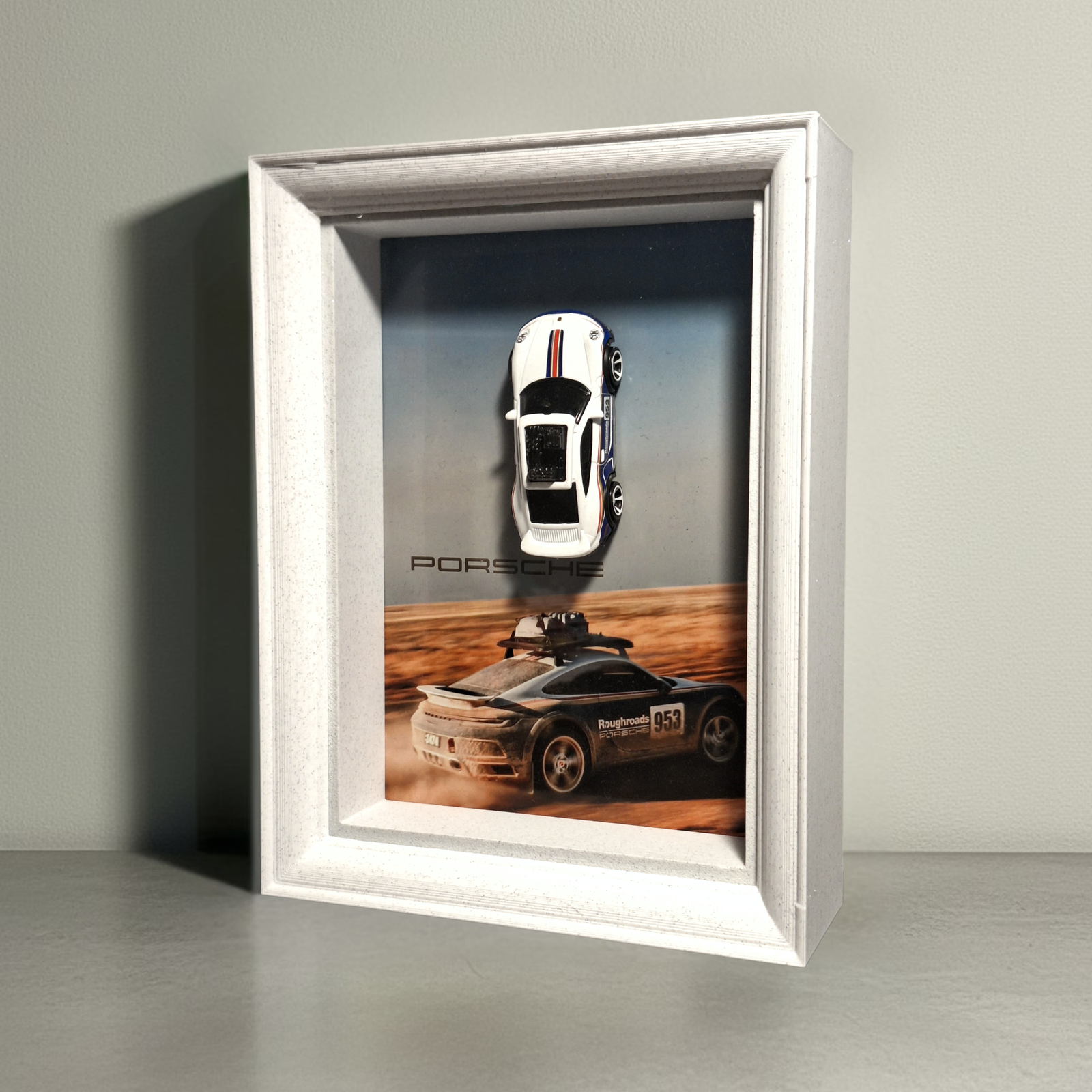 Ramka z modelem Porsche Dakar