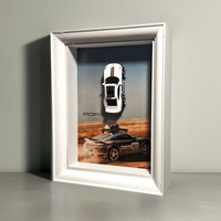Ramka z modelem Porsche Dakar